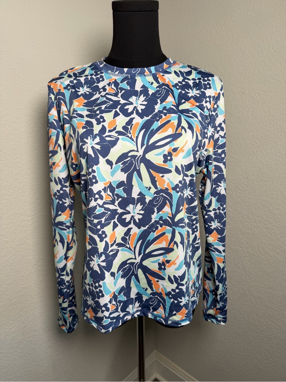 Roxy Long Sleeve Floral rashguard in Navy, Aqua & Orange